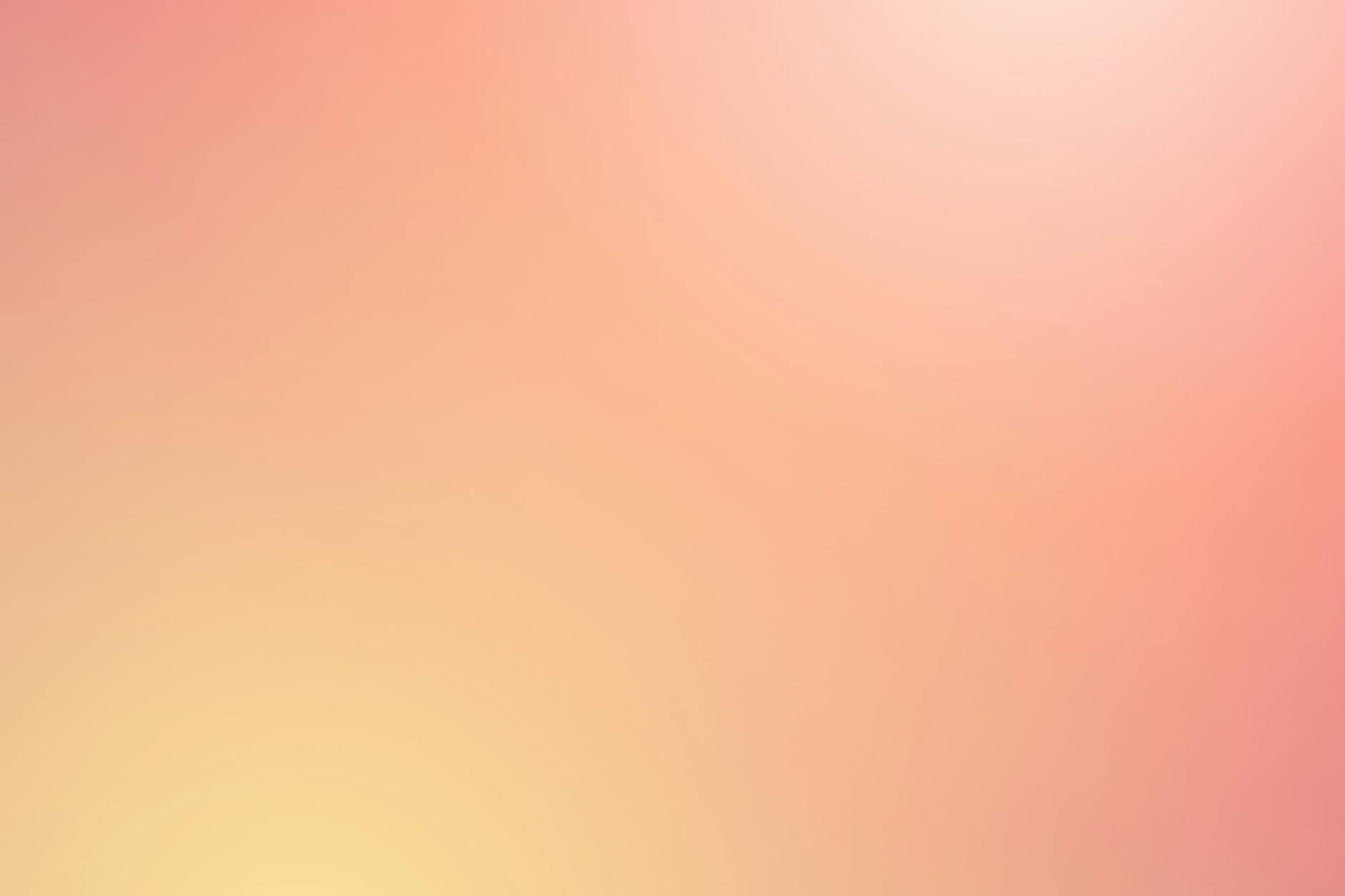 Abstrakcyjne miękkie tło w różowożółtym gradiencie